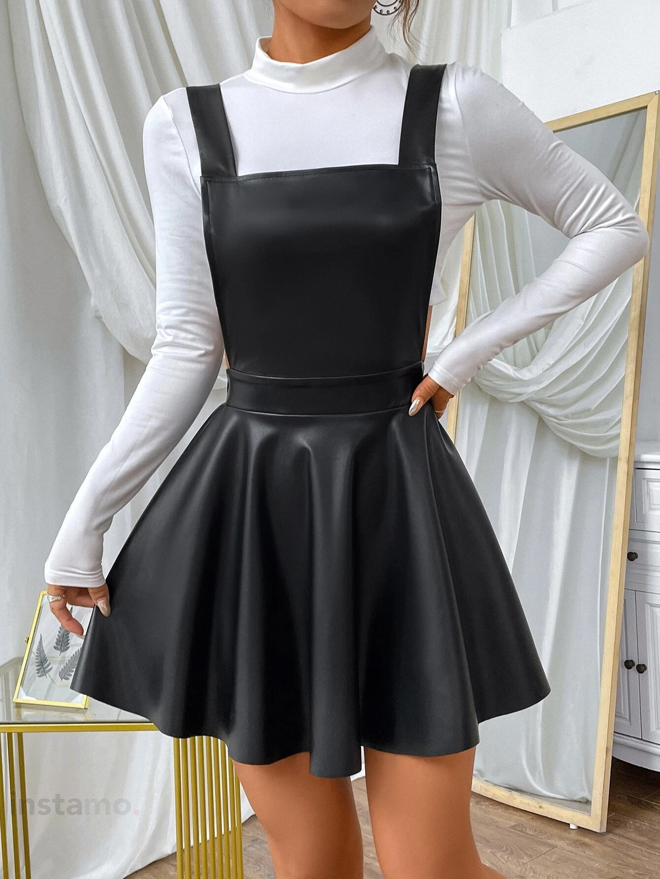 Černá koženková sukně na traky-279573-33
