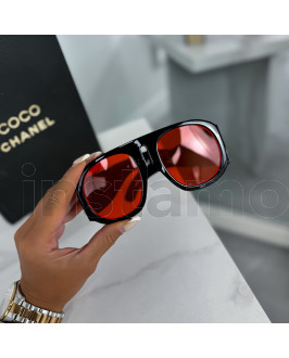 Červené sluneční brýle