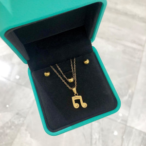 Dámská pozlacená ocelová souprava nota