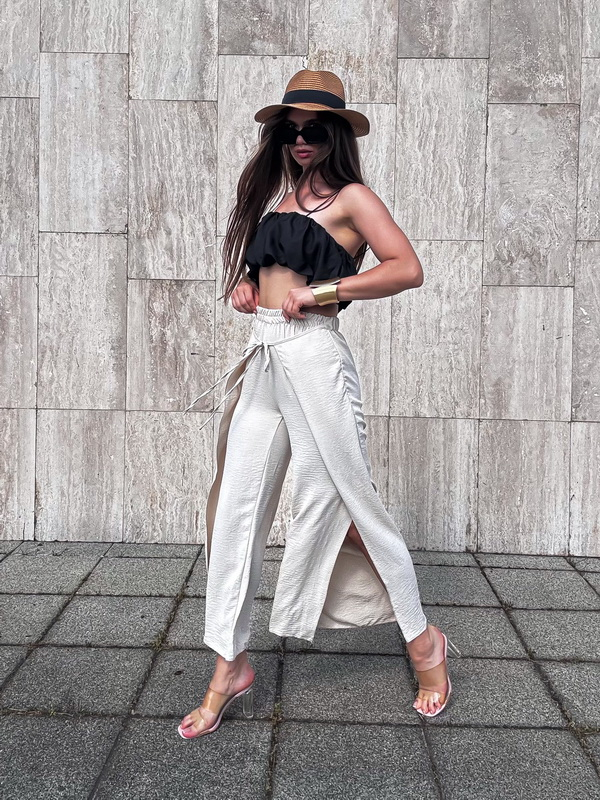 Béžové široké nohavice s rozparkem